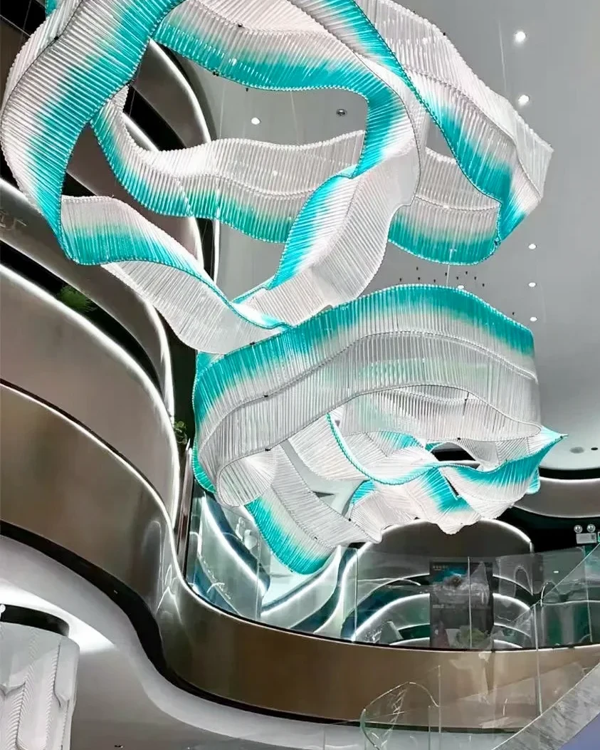 Artistic ribbon pendant light